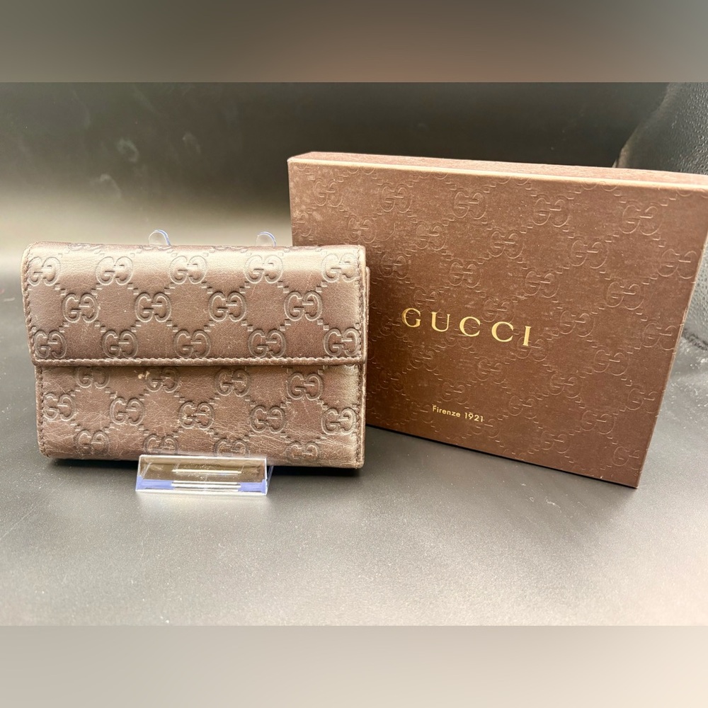 Gucci Brown GG Embossed Leather Wallet